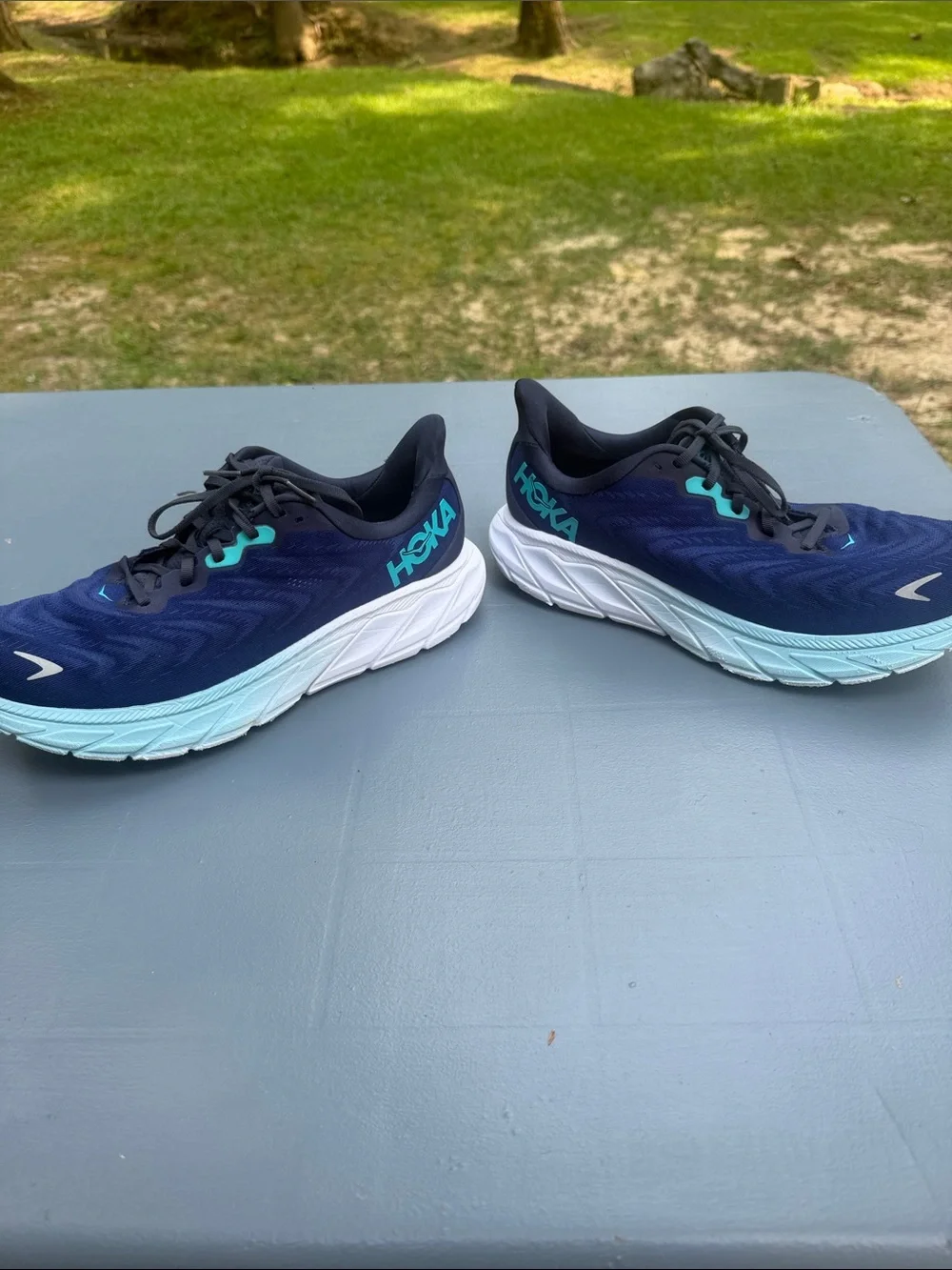 Hoka Navy Running Shoes with Aqua Accents. Wide shoes